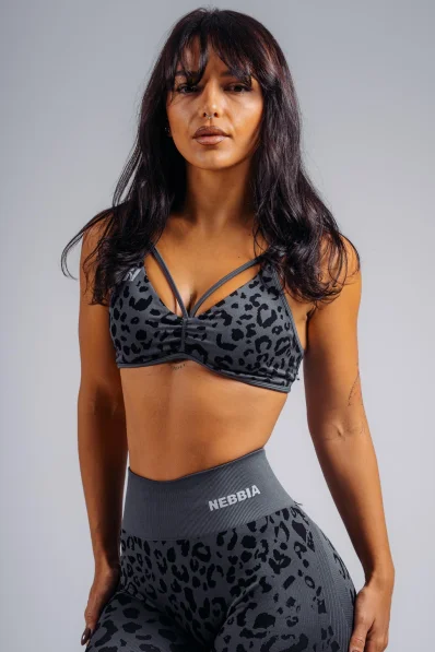 NEBBIA Medium support sports bra with leopard pattern PRIMAL black