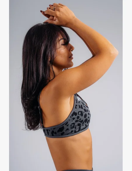 NEBBIA Medium support sports bra with leopard pattern PRIMAL black