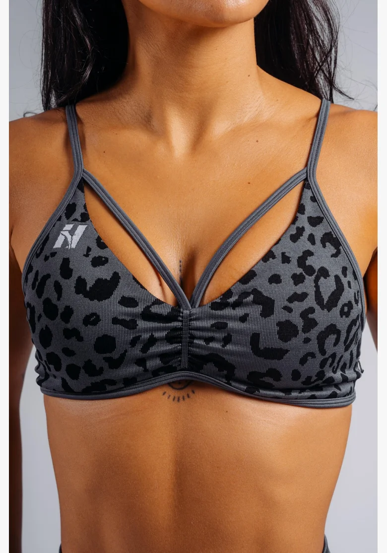 NEBBIA Medium support sports bra with leopard pattern PRIMAL black
