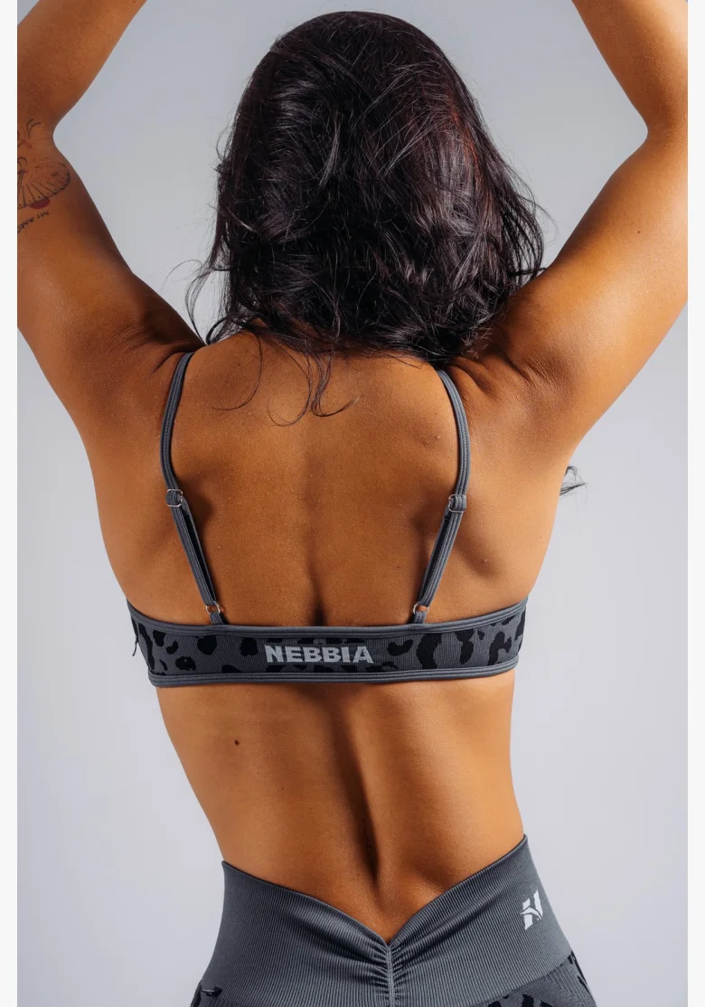NEBBIA Medium support sports bra with leopard pattern PRIMAL black