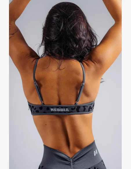 NEBBIA Medium support sports bra with leopard pattern PRIMAL black