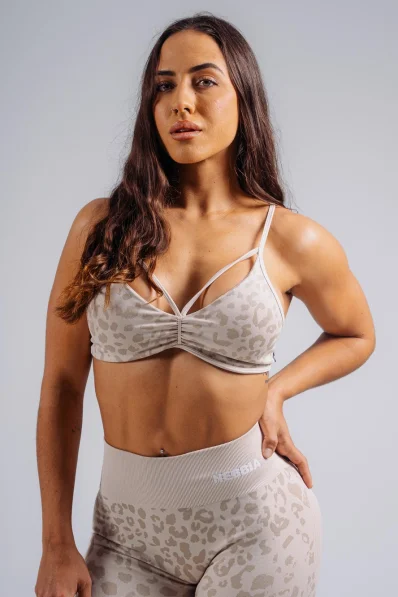 NEBBIA Medium support sports bra with leopard pattern PRIMAL cream