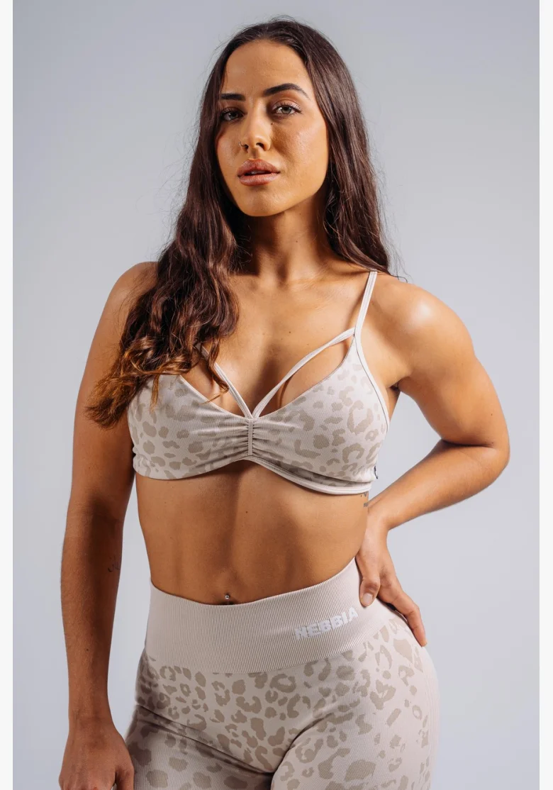 NEBBIA Medium support sports bra with leopard pattern PRIMAL cream