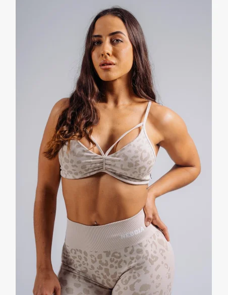 NEBBIA Medium support sports bra with leopard pattern PRIMAL cream
