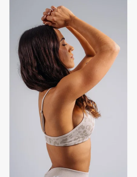 NEBBIA Medium support sports bra with leopard pattern PRIMAL cream