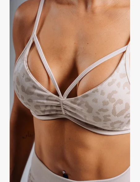 NEBBIA Medium support sports bra with leopard pattern PRIMAL cream