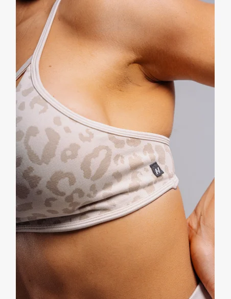 NEBBIA Medium support sports bra with leopard pattern PRIMAL cream