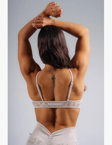 NEBBIA Medium support sports bra with leopard pattern PRIMAL cream