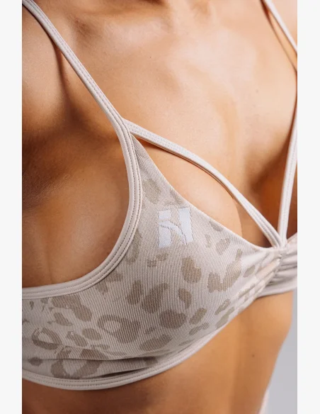 NEBBIA Medium support sports bra with leopard pattern PRIMAL cream