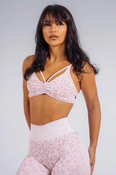 NEBBIA Medium support sports bra with leopard pattern PRIMAL pink