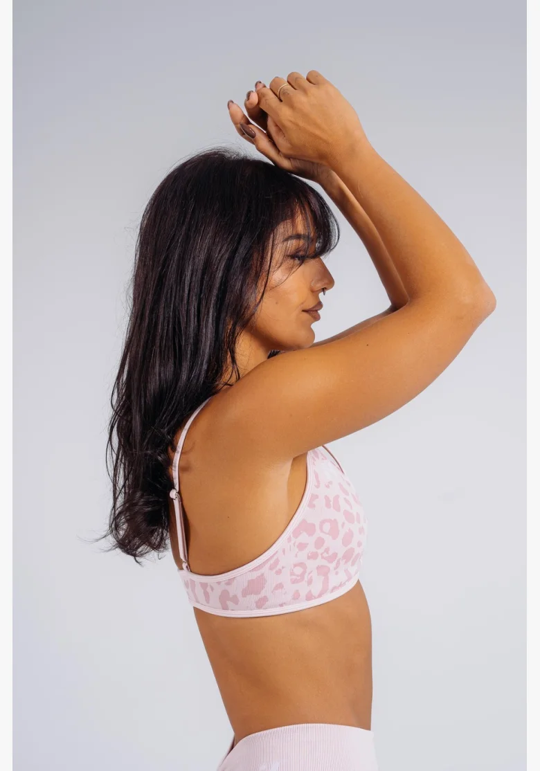 NEBBIA Medium support sports bra with leopard pattern PRIMAL pink