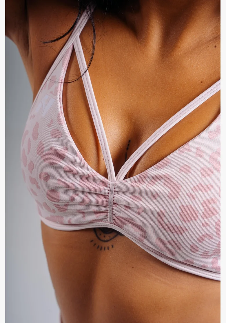 NEBBIA Medium support sports bra with leopard pattern PRIMAL pink