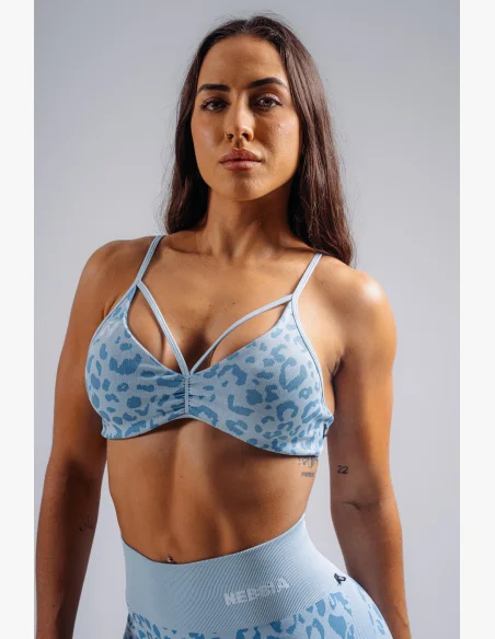 NEBBIA Medium support sports bra with leopard pattern PRIMAL blue