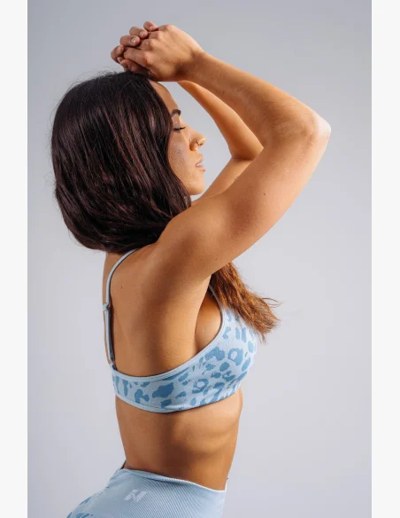 NEBBIA Medium support sports bra with leopard pattern PRIMAL blue