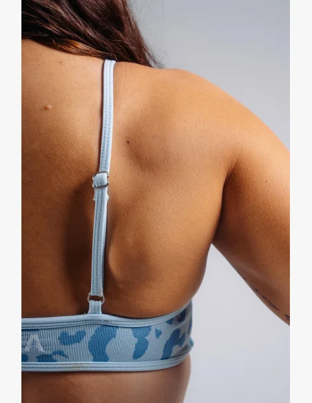 NEBBIA Medium support sports bra with leopard pattern PRIMAL blue