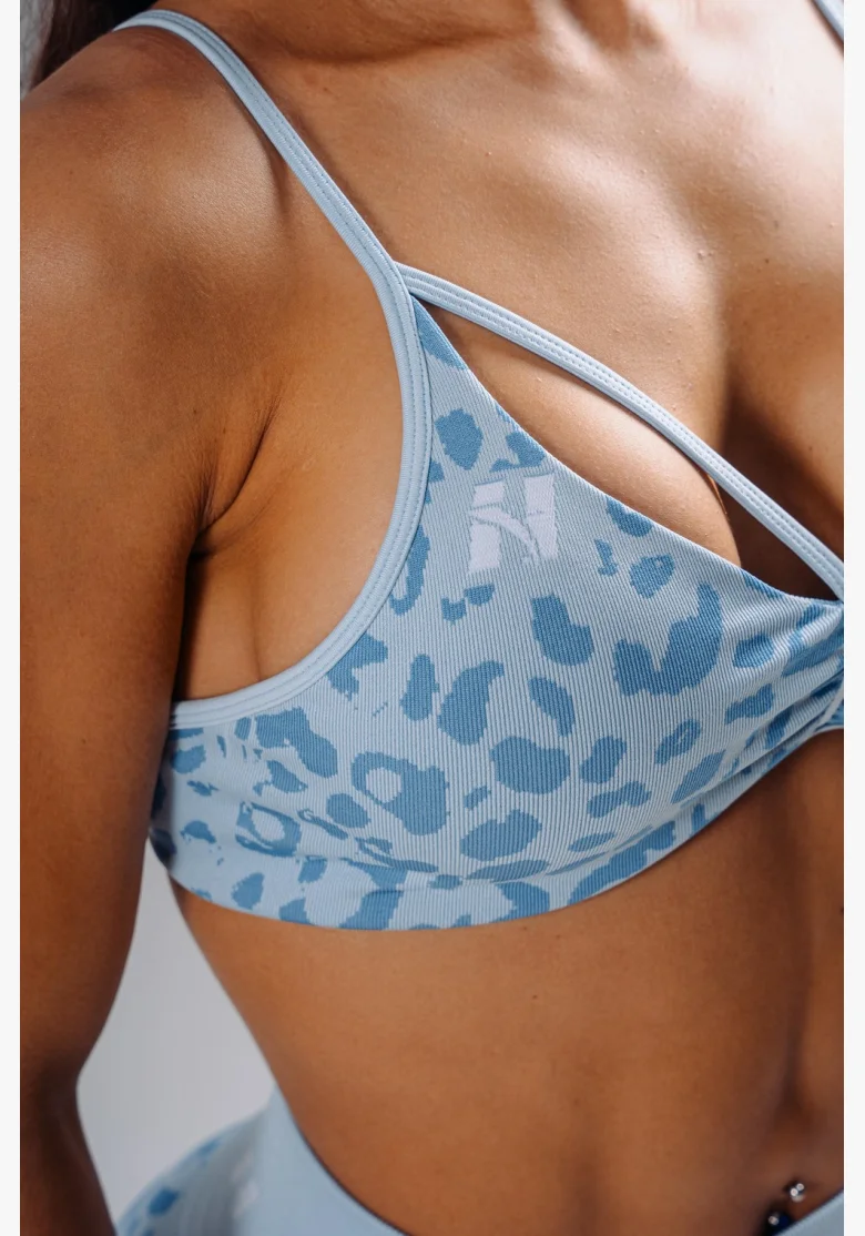 NEBBIA Medium support sports bra with leopard pattern PRIMAL blue