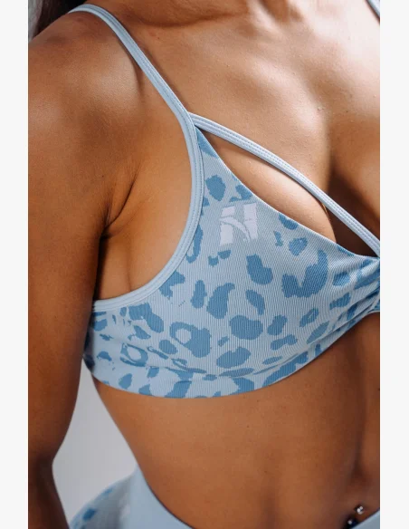 NEBBIA Medium support sports bra with leopard pattern PRIMAL blue