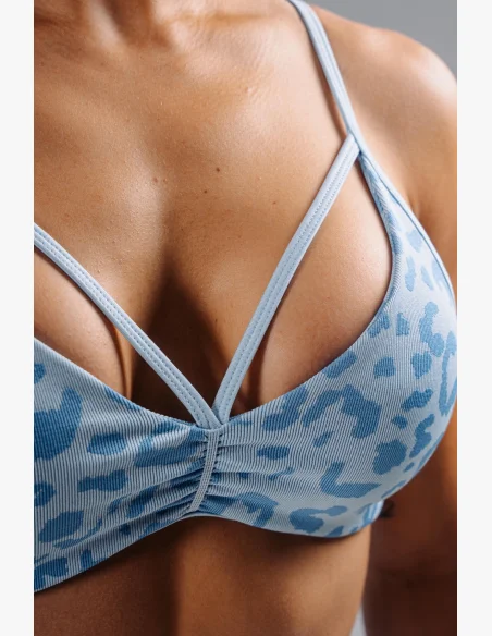 NEBBIA Medium support sports bra with leopard pattern PRIMAL blue