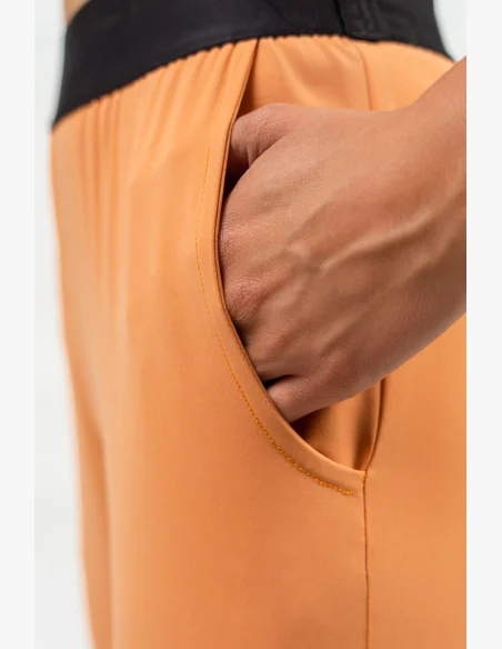 NEBBIA • Slim fit leggings with pockets GYM SPIRIT orange • Nebshop.cz