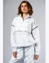 Lightweight women's tracksuit jacket in premium design with elegant green and gold details.